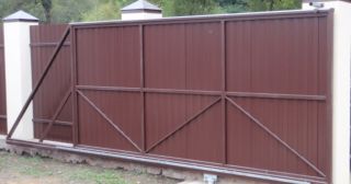 Купить откатные ворота из профнастила Лесозаводск, цена от 1787 руб.