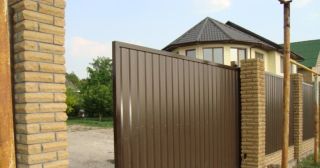 Купить откатные ворота из профнастила Лесозаводск, цена от 1787 руб.